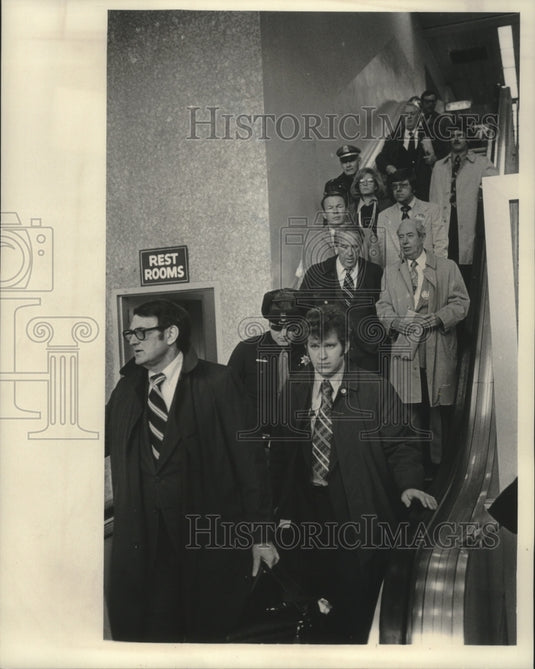 1976 Congressman Henry Jackson on escalator at Milwaukee airport - Historic Images