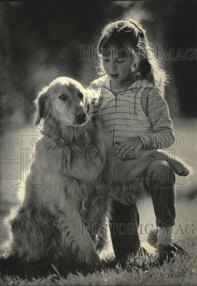 1984 Press Photo Child and Pet Dog together - mjb78319 - Historic Images