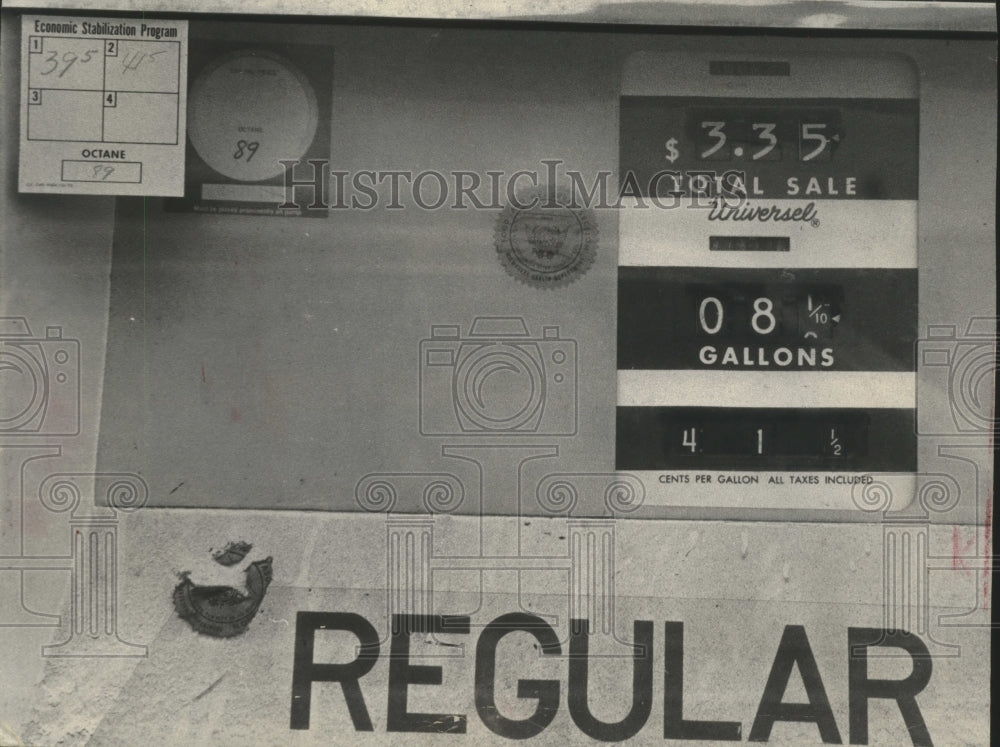 1974 Press Photo Gas pump has both old and new price stickers on pump, Wisconsin-Historic Images