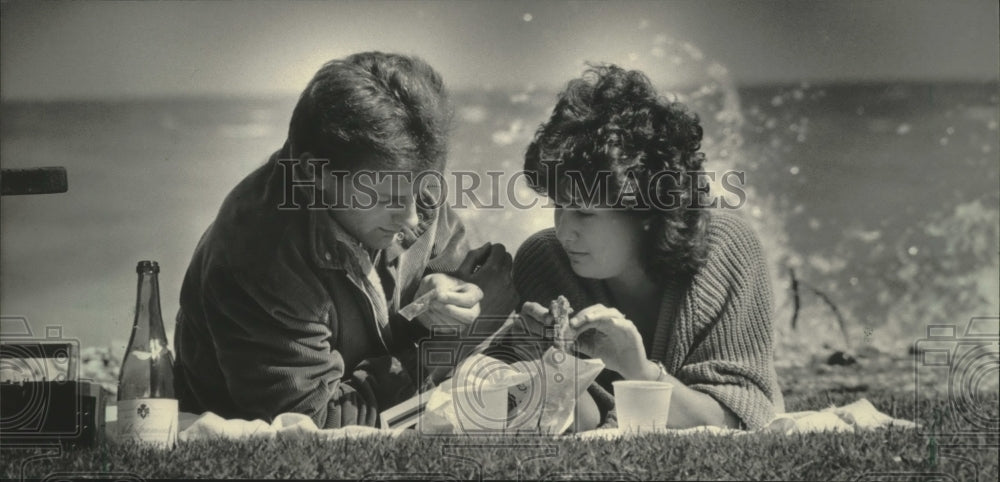 1985 Tom Hug and Christine Collentine picnic at Bradford Beach - Historic Images