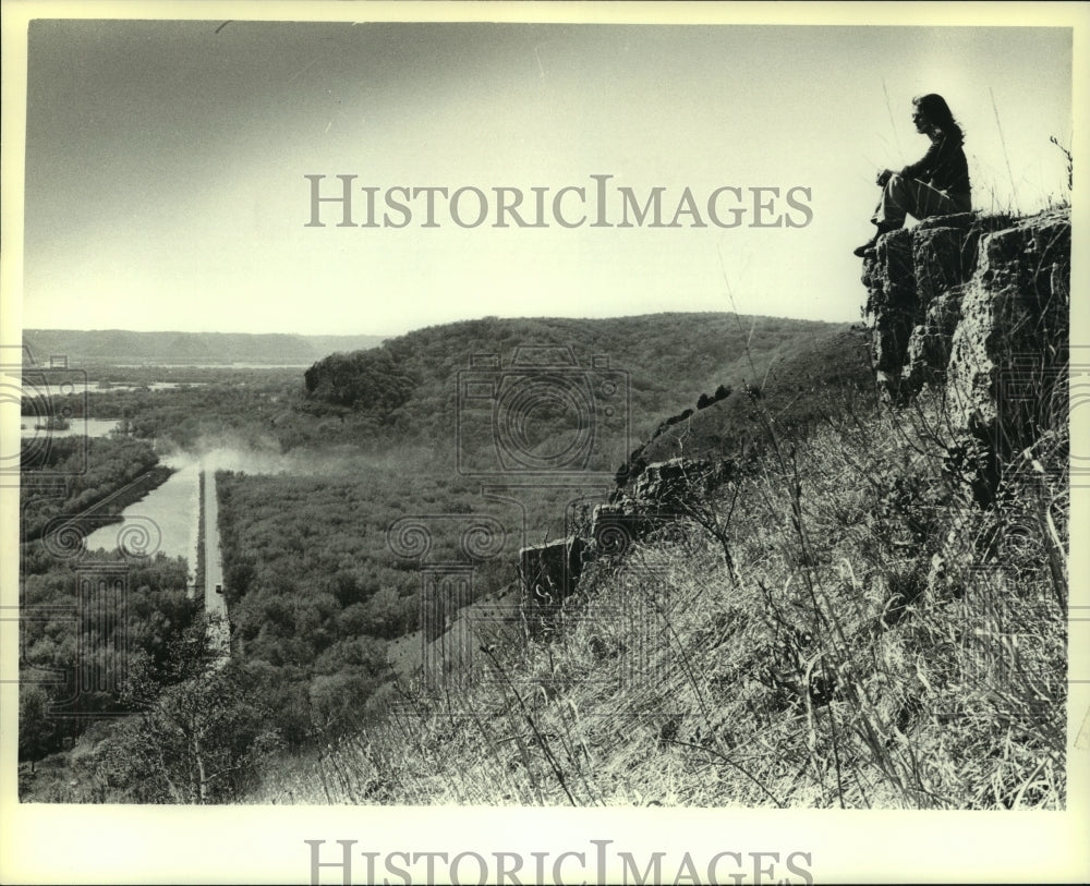 1979 Visitor sits Mississippi River from Rush Creek Bluff-Historic Images