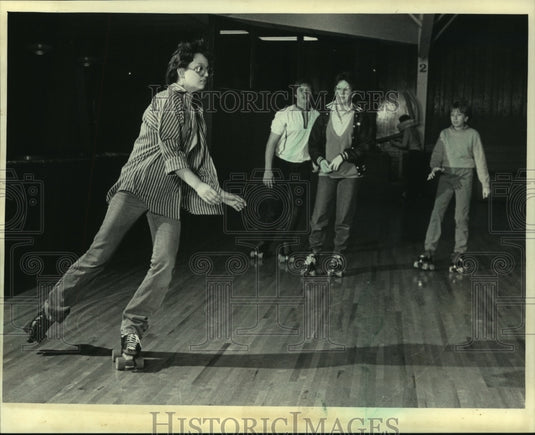 1985 Roller skaters at Waukesah Skateland or cancer education - Historic Images