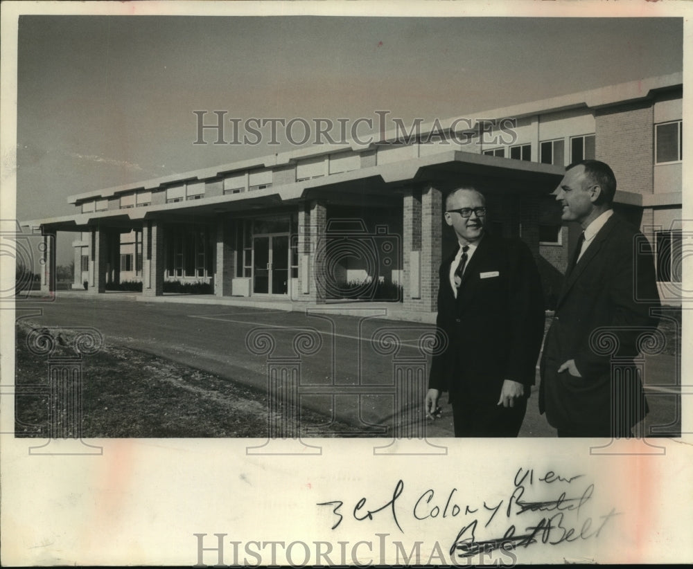 1965 John Garstecki, Paul Weisel by new colony hospital, Wisconsin.-Historic Images