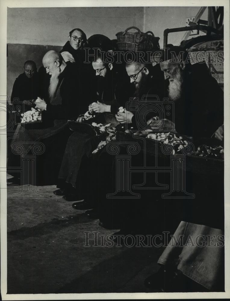 1948 Press Photo Monks working together to pare apples - mjb80186 - Historic Images