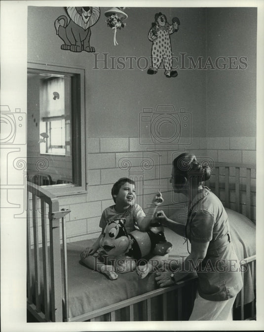 1979 Mrs. Margaret Worden, Southern Wisconsin Center with resident - Historic Images