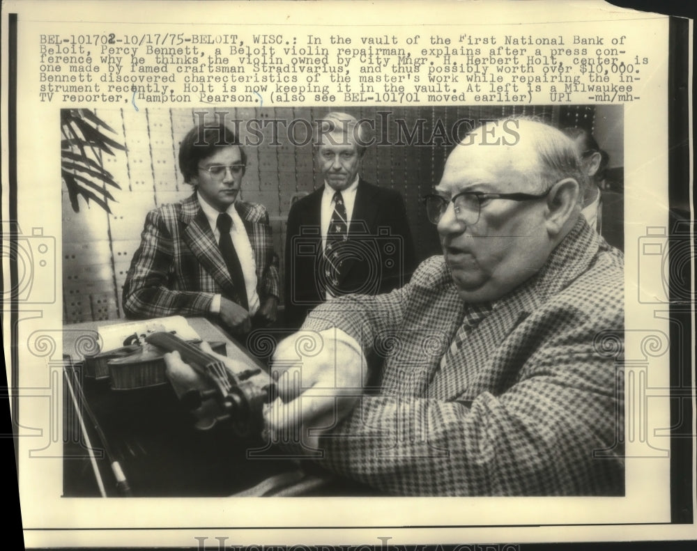 1975 Beloit Wisconsin, Men looking at violin in vault of bank-Historic Images