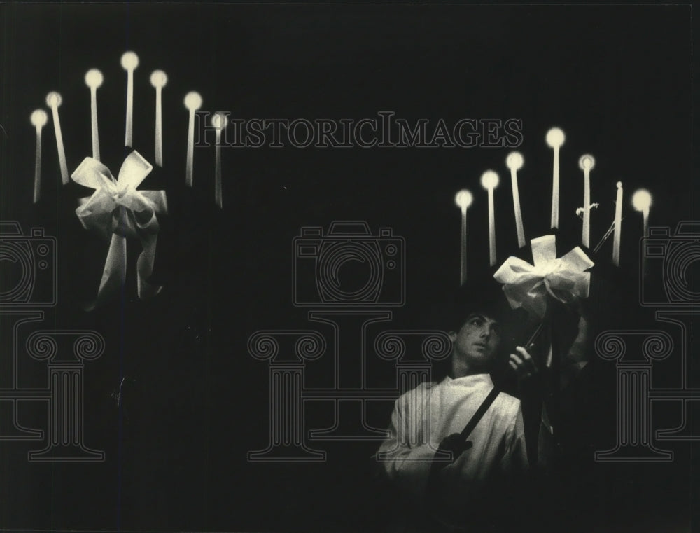 1991 Andrew Dodge Lights Candles at Holy Trinity Lutheran Church-Historic Images