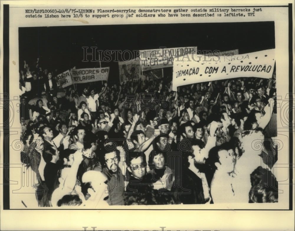 1975 Lisbon: Placard-carrying demonstrators gather-Historic Images