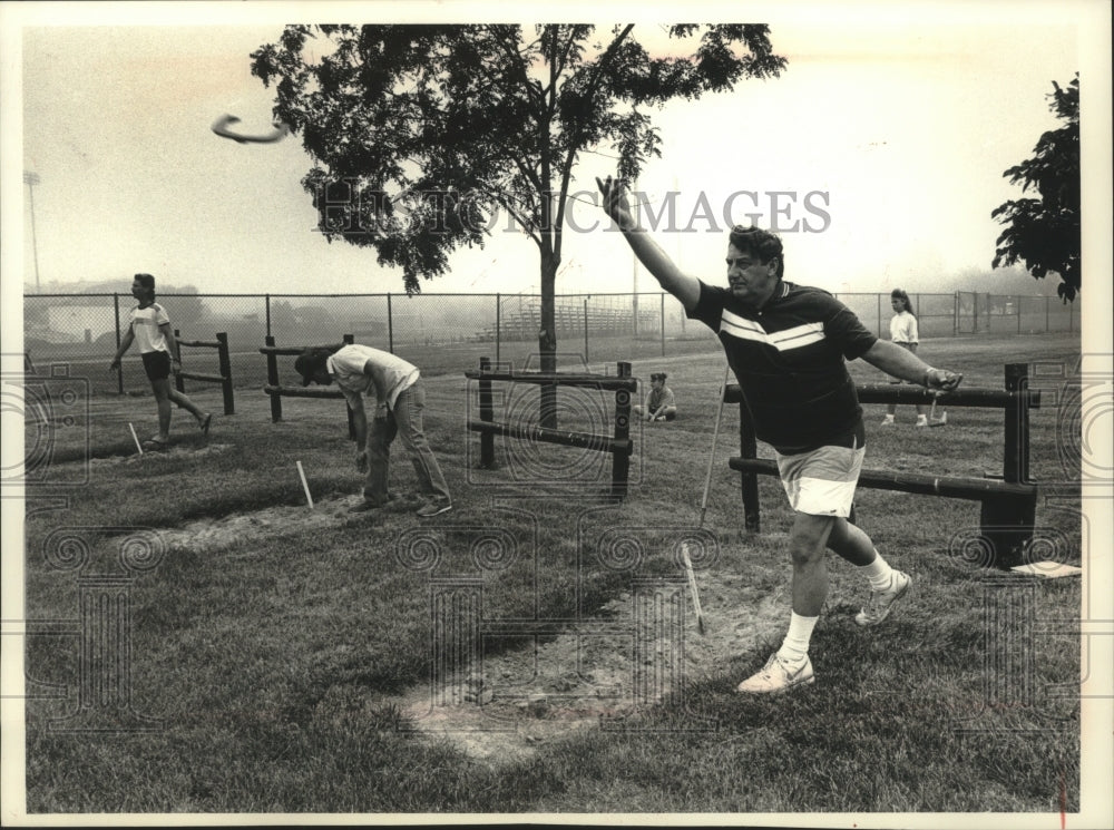 1989 Cudahy Mayor Peter Pekar playing horseshoes at city picnic.-Historic Images