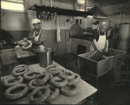 1980 Walter Otto works with an employee in his shop in Germantown - Historic Images