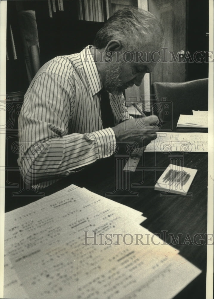 1993 Frank Parsons works on a drawing of school plans in MIlwaukee - Historic Images
