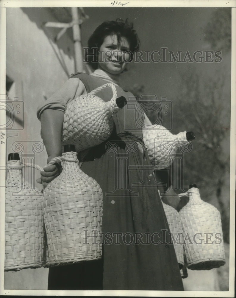 1957 Portugal - Custom-tailored Jugs all wrapped in wicker-Historic Images