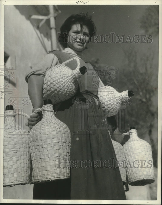 1957 Portugal - Custom-tailored Jugs all wrapped in wicker-Historic Images