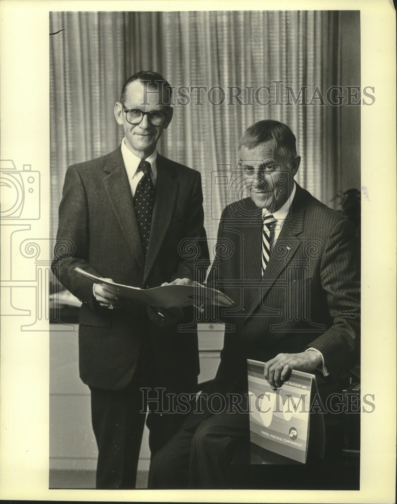 1980 Press Photo Jack E. Knake, Director, and Roger L. Perry, Vice President - Historic Images