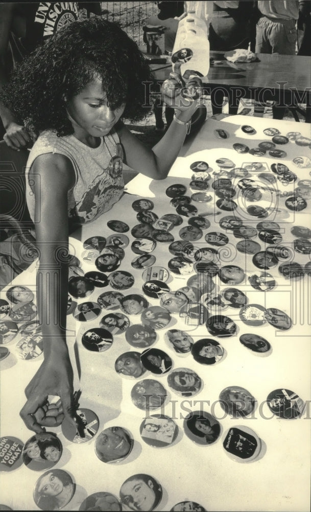 1984 Wendy Guy arranged buttons to sell at Juneteenth Day festival-Historic Images