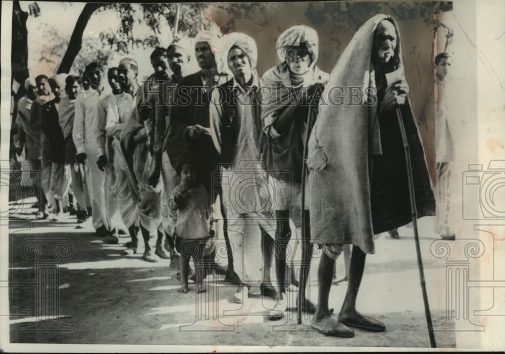 1957 Indian men waiting in polling line, Sikri, India-Historic Images