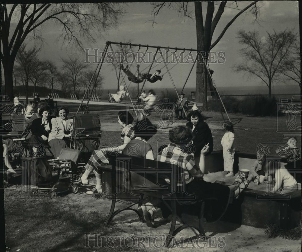 1950 Group enjoying springtime at Juneau Park Milwaukee - Historic Images