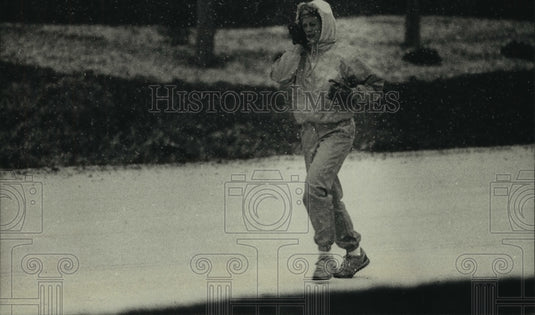 1988 Cynthia Christiansen running in the snow, Concord Dr, Milwaukee-Historic Images