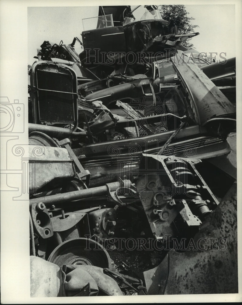 1968 Piles of junked auto in suburban area-Historic Images