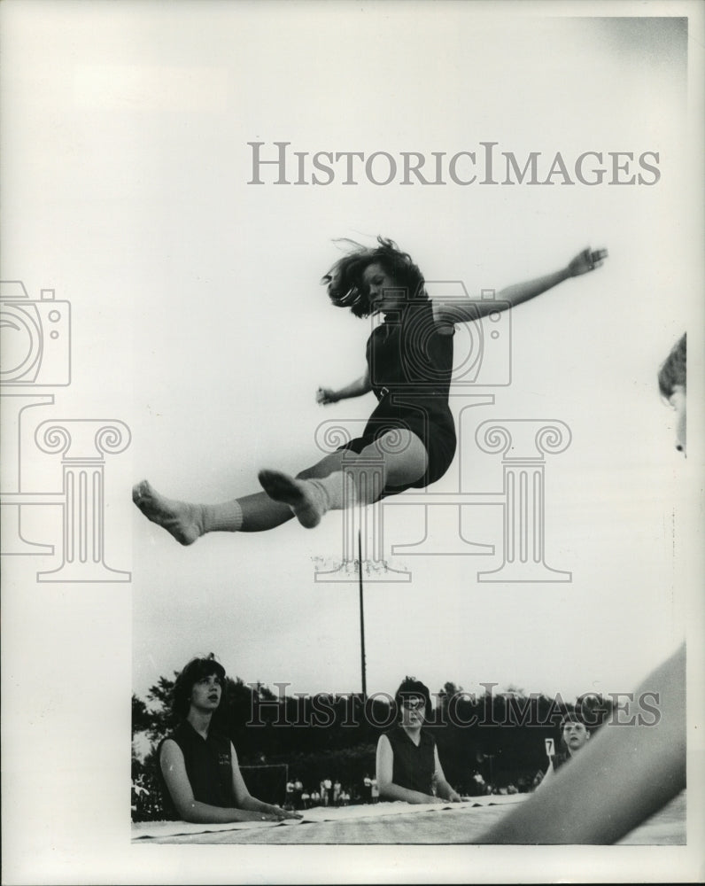 1964 Press Photo Woman on a trampoline, Physical Fitness - mjb84625-Historic Images