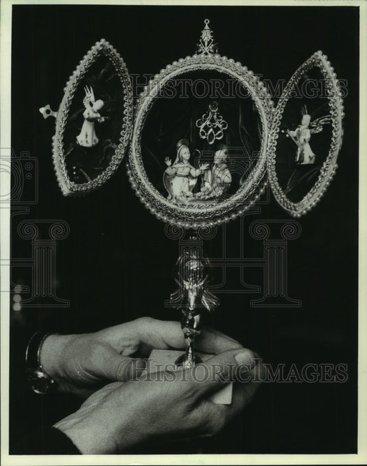 1983 Ed Polodna holds an antique in Wisconsin La Crosse - Historic Images