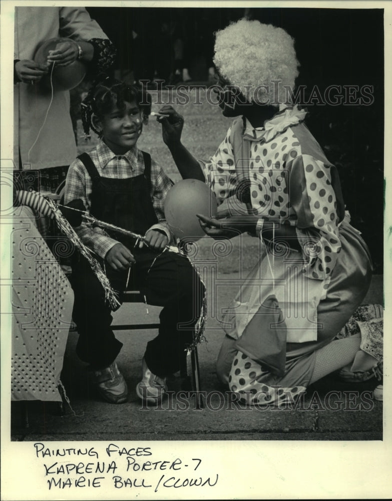 1985 Little girl getting face painted during Juneteenth Day - Historic Images