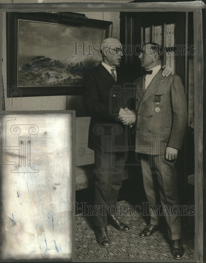 1925 James Miller Shaking Hand of Captain Lingar Olson - Historic Images