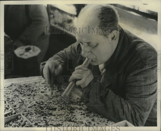 1952 Press Photo St Mark's pieces dusted off by workman - mjb86045 - Historic Images