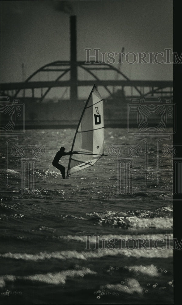 1989 A windsurfer near Bradford Beach, backdrop of Hoan Bridge-Historic Images