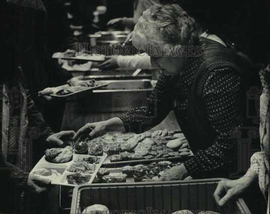 1984 Food line at St. Benedict the Moor Catholic Church. - Historic Images