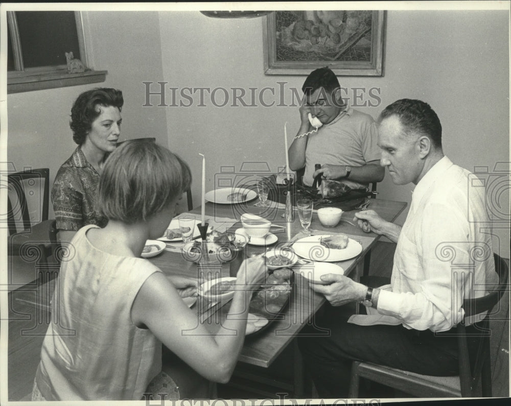 1963 Press Photo Pierre Salinger with wife and dinner guests - mjb88372-Historic Images