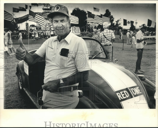 1988 Paul Poverezny giving the thumbs up in his Red One Volkswagen-Historic Images