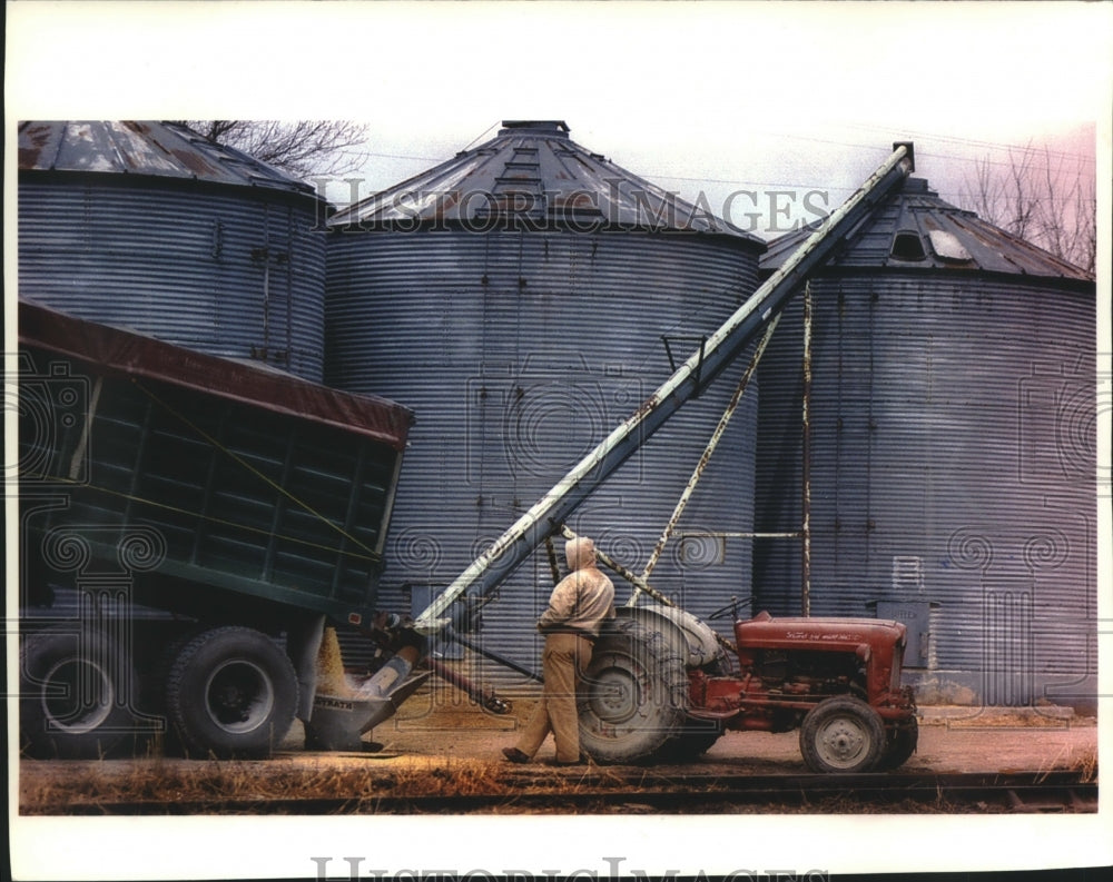 1994 Lee Kissinger unloads feed corn into a silo, Saukville Feed-Historic Images