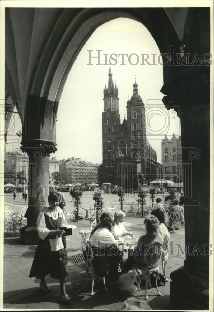 1988 Waitress served customers at outdoor cafe in Krakow, Poland-Historic Images