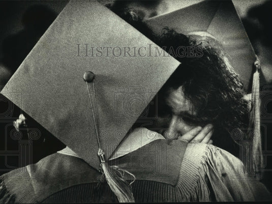 1991 Kerry Duffy hugs a classmate, St. Mary's Academy graduation - Historic Images