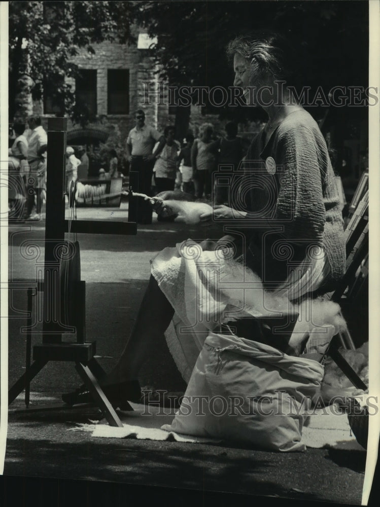 1983 Mary Ann Richter spun wool at Delafield Days Art Festival - Historic Images