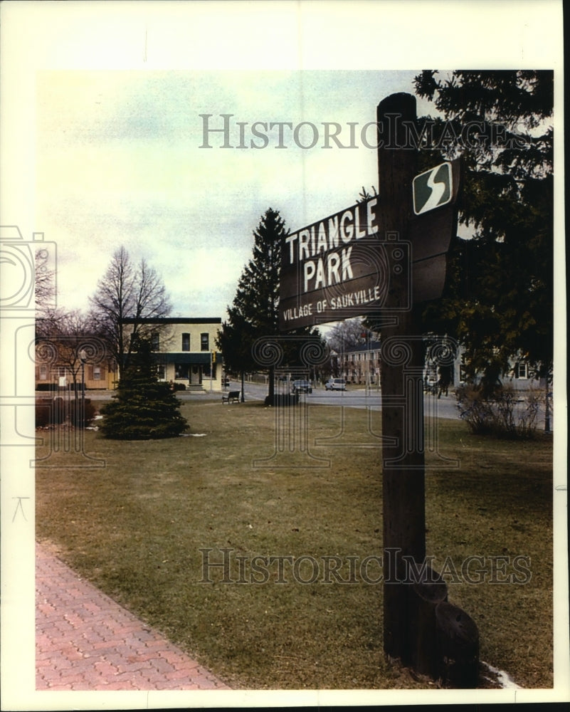 1994 Triangle Park sign,  in heart of Village, Saukville, Wisconsin. - Historic Images