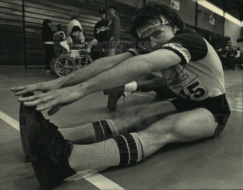 1988 Shawn Draginis warms up before his Special Olympics event - Historic Images