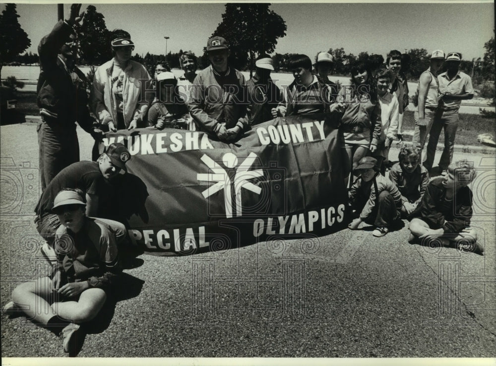 1982 Coaches and athletes of Waukesha County Special Olympic Team - Historic Images