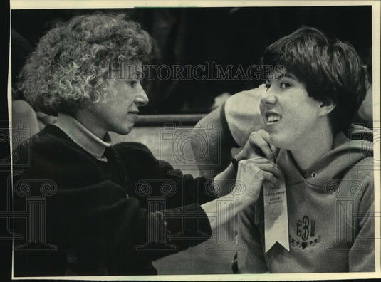 1985 Polly Beal put ribbon on her daughter, Cecily, Special Olympics-Historic Images