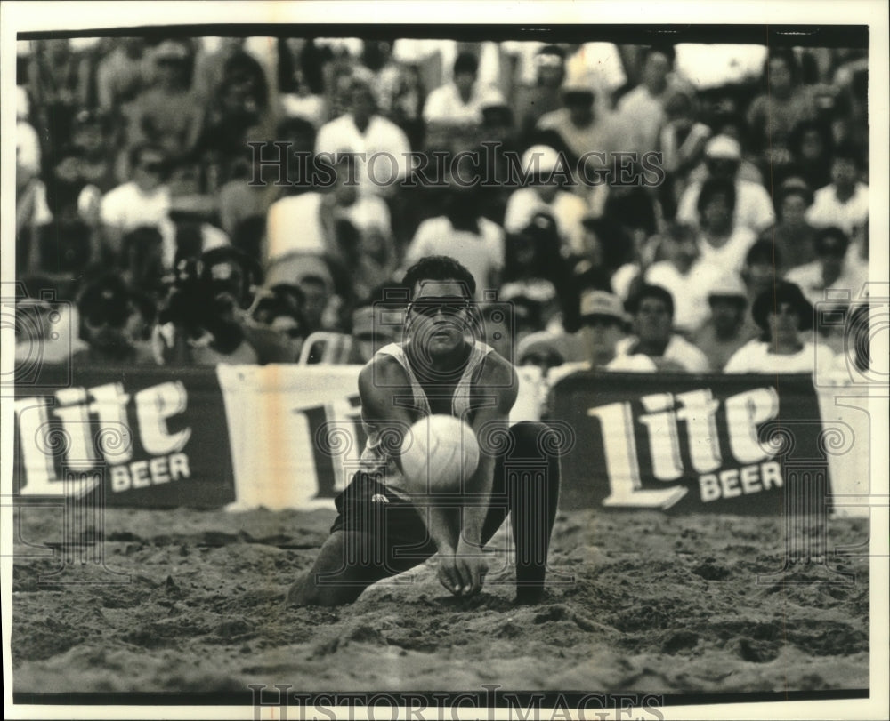 1992 Ken Steffes digs ball during beach volleyball championship. - Historic Images