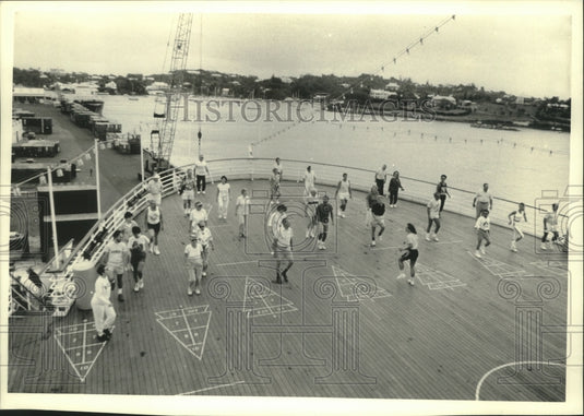 1991 Press Photo Passengers doing aerobics on deck of cruise ship. - mjb96713 - Historic Images