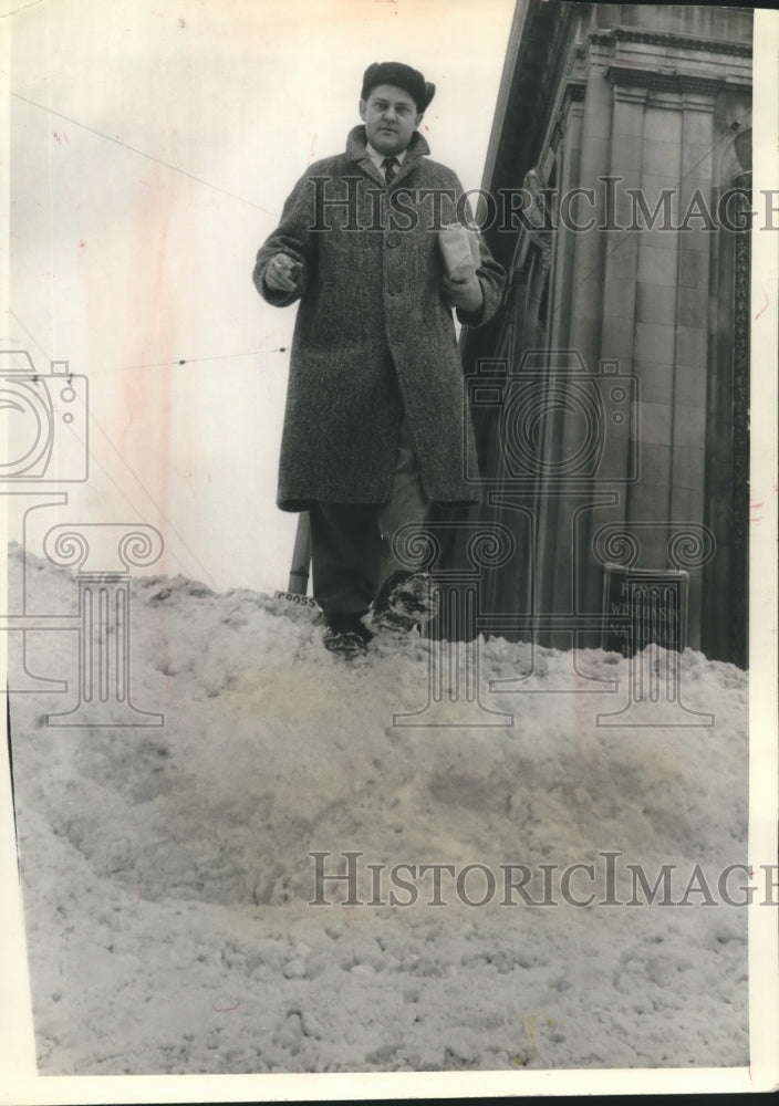 Press Photo John A. Eschweiler, walked over a tall snowbank, Milwaukee - Historic Images