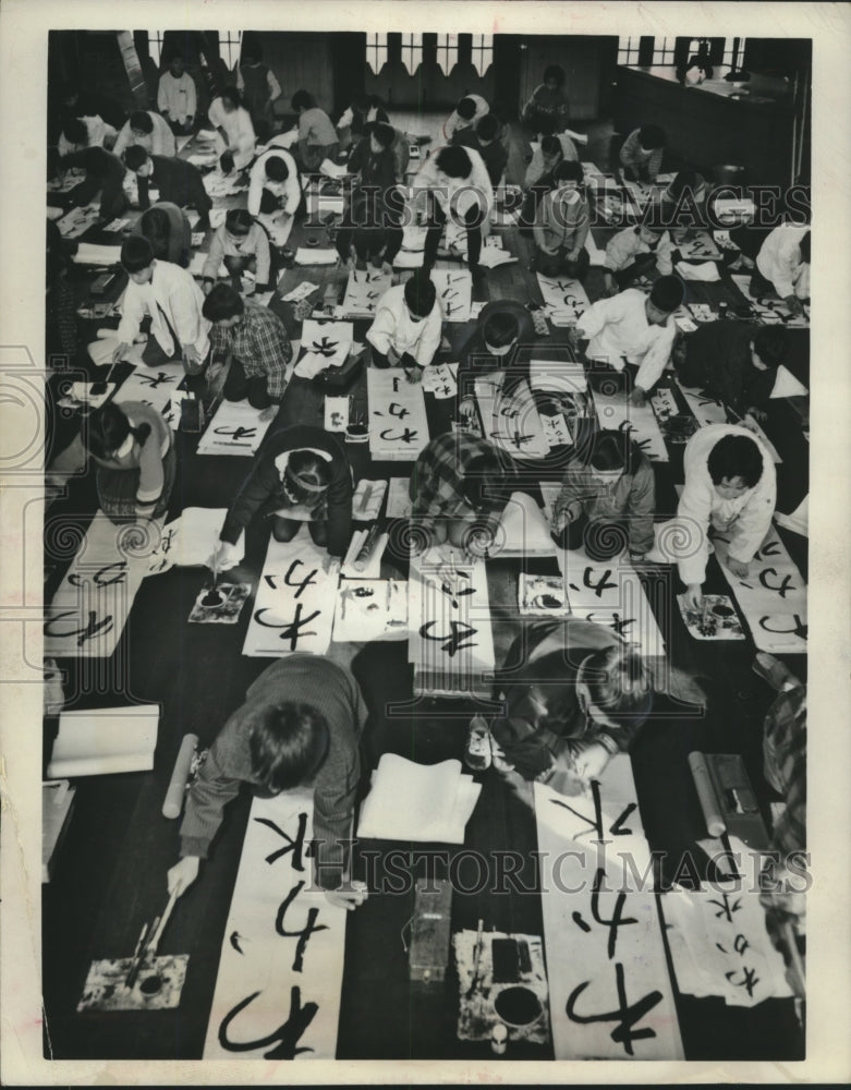 1963 Press Photo Tokyo, young students painting their ABC's - mjb98555 - Historic Images