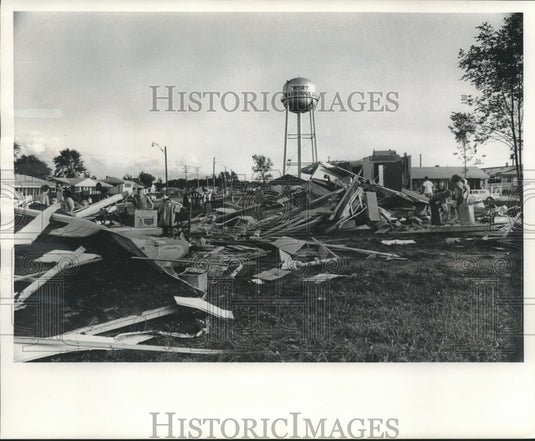 1964 Press Photo People looking through home destroyed by tornado, Wisconsin. - Historic Images