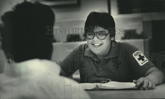 1985 Press Photo Tyrone Wheelock, 14, works with the American Red Cross - Historic Images