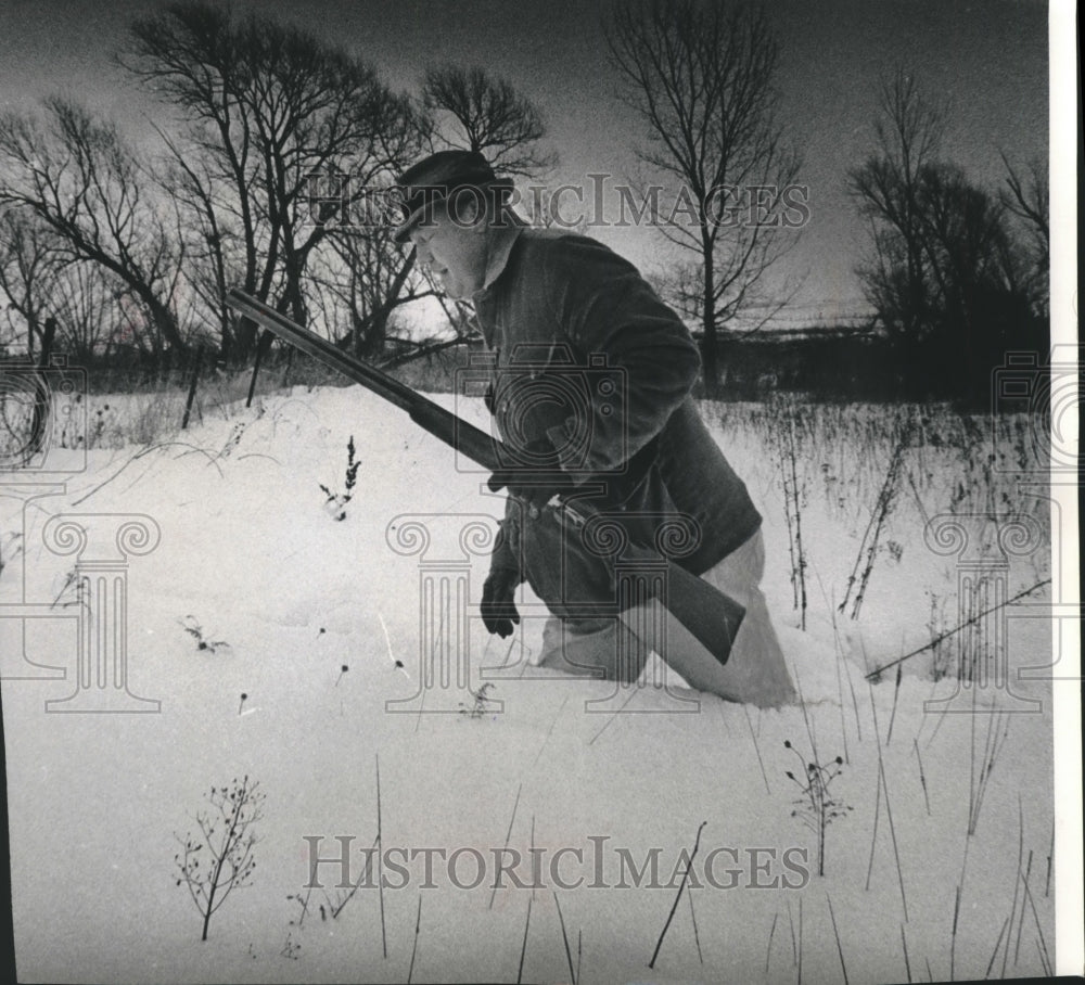 1967 Press Photo Hunter walking through snow looking for pheasants - mjb99145 - Historic Images
