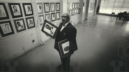 1980 Robert Taylor stood proudly in Gallery of Famous Black American-Historic Images