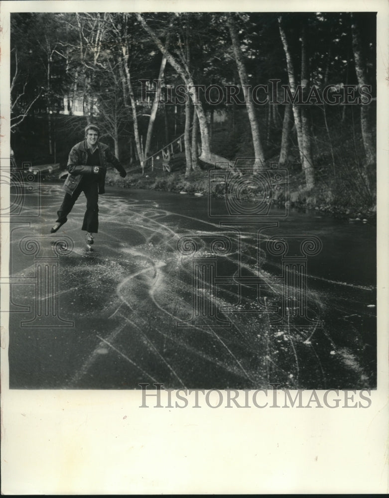 1960 Young skater enjoyed skating on small lake in Oneida County - Historic Images