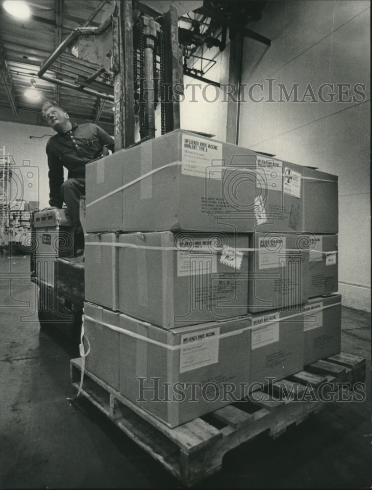 1976, Erwin Semski with shipment of swine flu vaccine in Wauwatosa - Historic Images